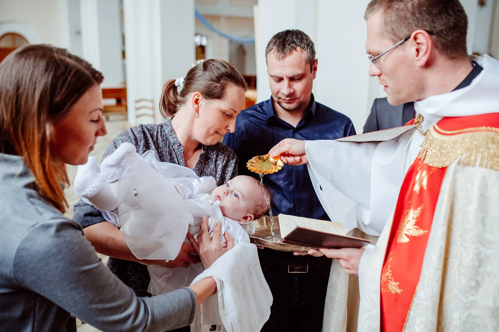 Kristības. Ludzas Jaunavas Marijas Debesīs uzņemšanas Romas katoļu baznīca