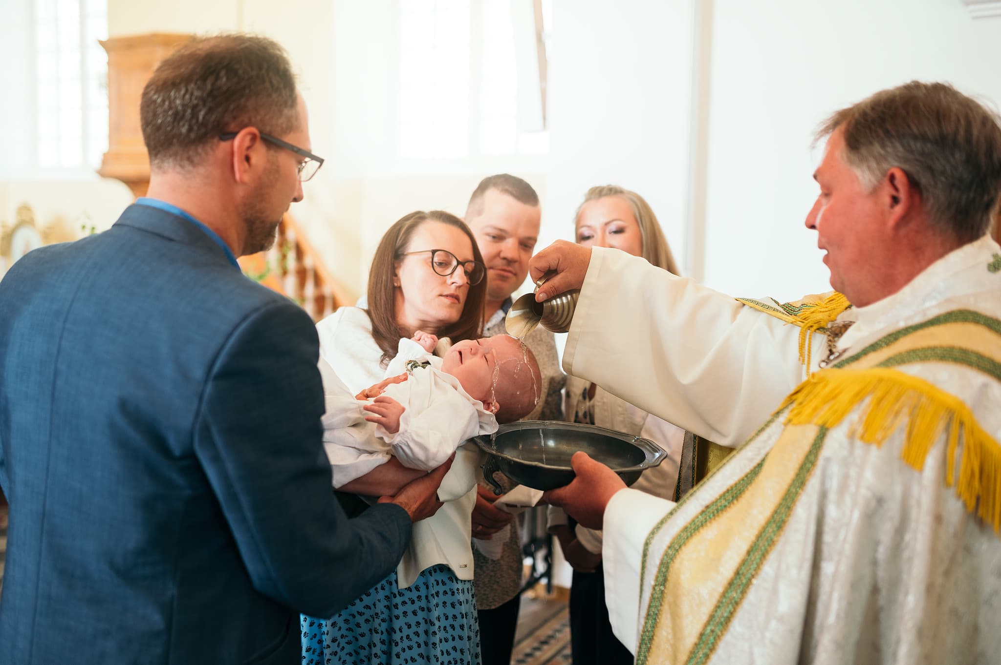 Kristību mirklis Sarkaņu Jaunavas Marijas bezvainīgās ieņemšanas Romas katoļu baznīcā